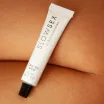 BIJOUX INDISCRETS stimuláló ajakbalzsam Oral Sex Balm 10 ml - orális szexhez, síkosító és hűsítő hatással, kókusz illattal